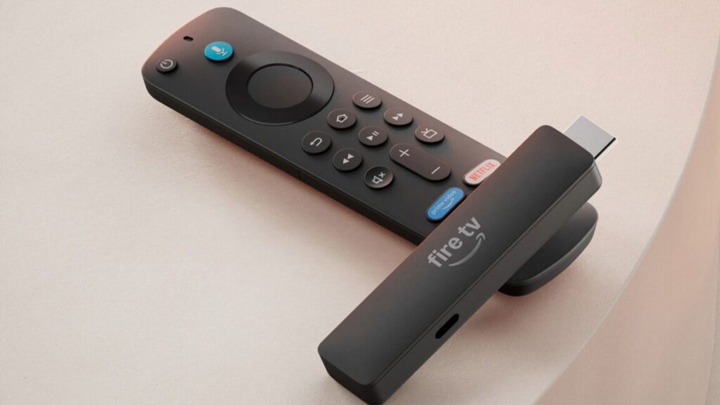 The new new Amazon Fire TV Stick HD on top of a remote.