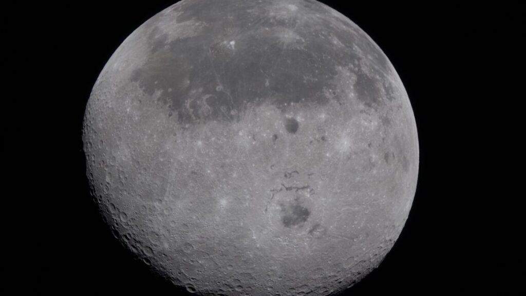 Astronauts set distance record, revealing the Moon as a place to be explored