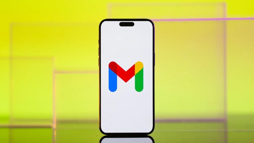 The Google Gmail logo is centered on a mobile phone screen.