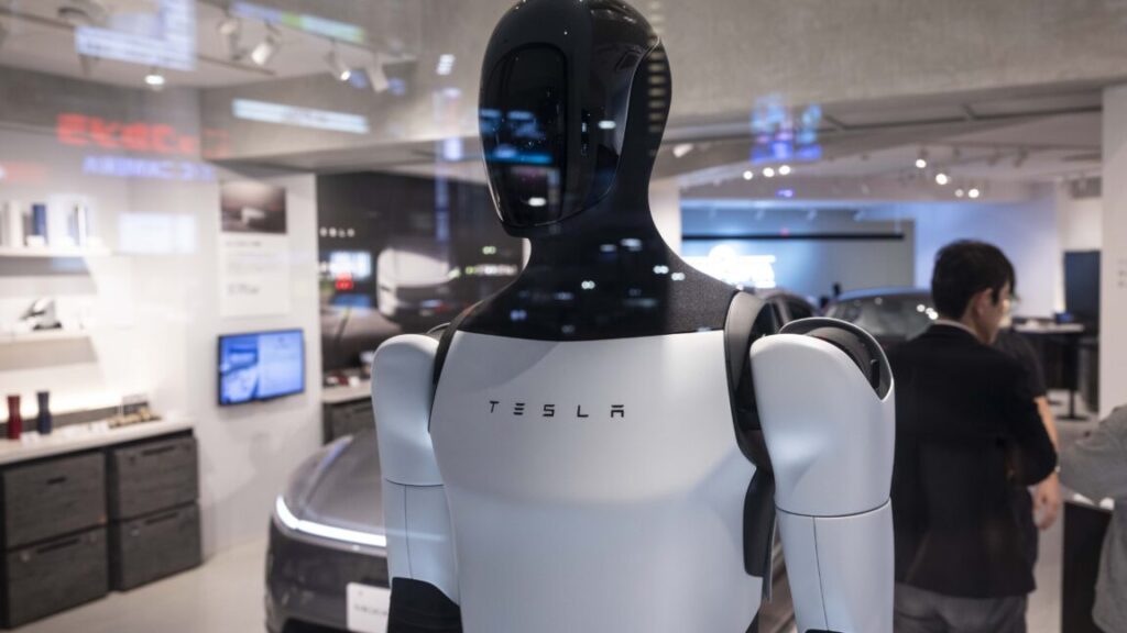 JAPAN - 2025/04/25: Tesla Optimus humanoid robot on display inside the Tesla pop-up store near Shibuya crossing. In April 2025, Tesla opened a pop-up store in Shibuya, Tokyo,