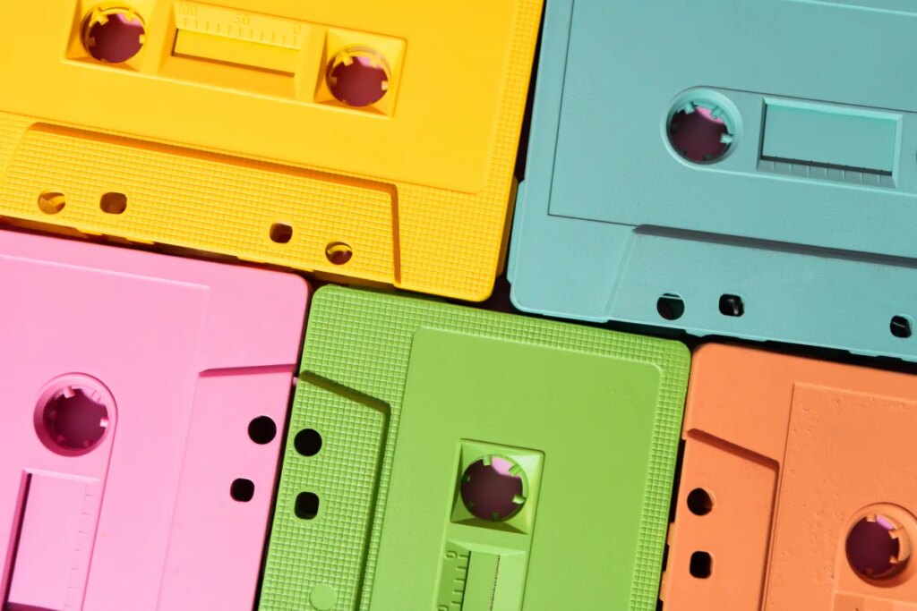 Vibrant cassette tapes in yellow, pink, green, blue, and orange